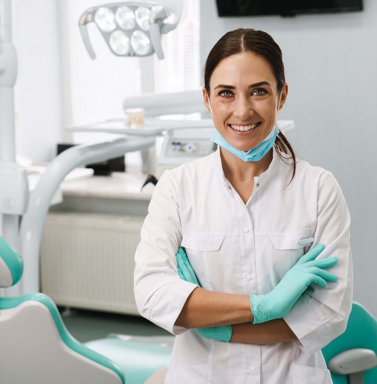 European Mid Dentist Woman Smiling While Standing In Dental Clinic